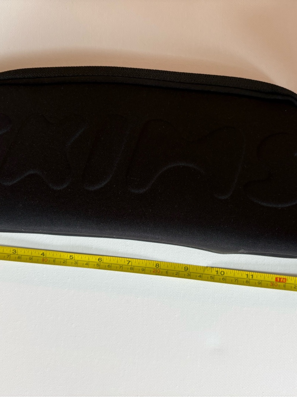 SKIMS Black Embossed Padded Cosmetic Case